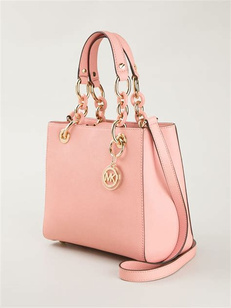 michael kors purse pink and white